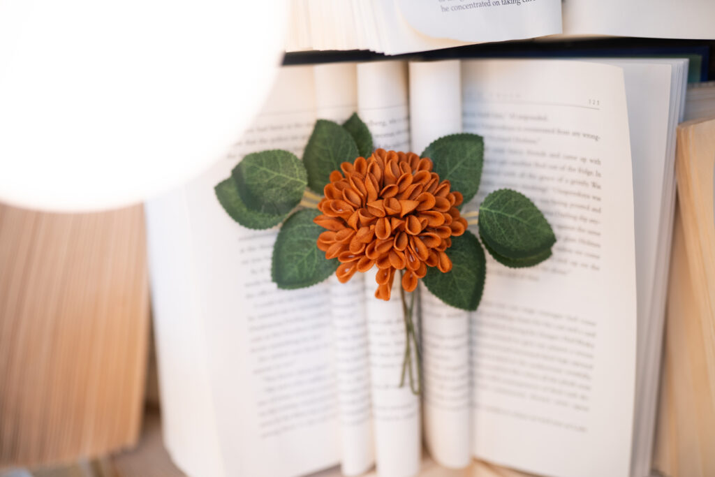 orange flower in a book